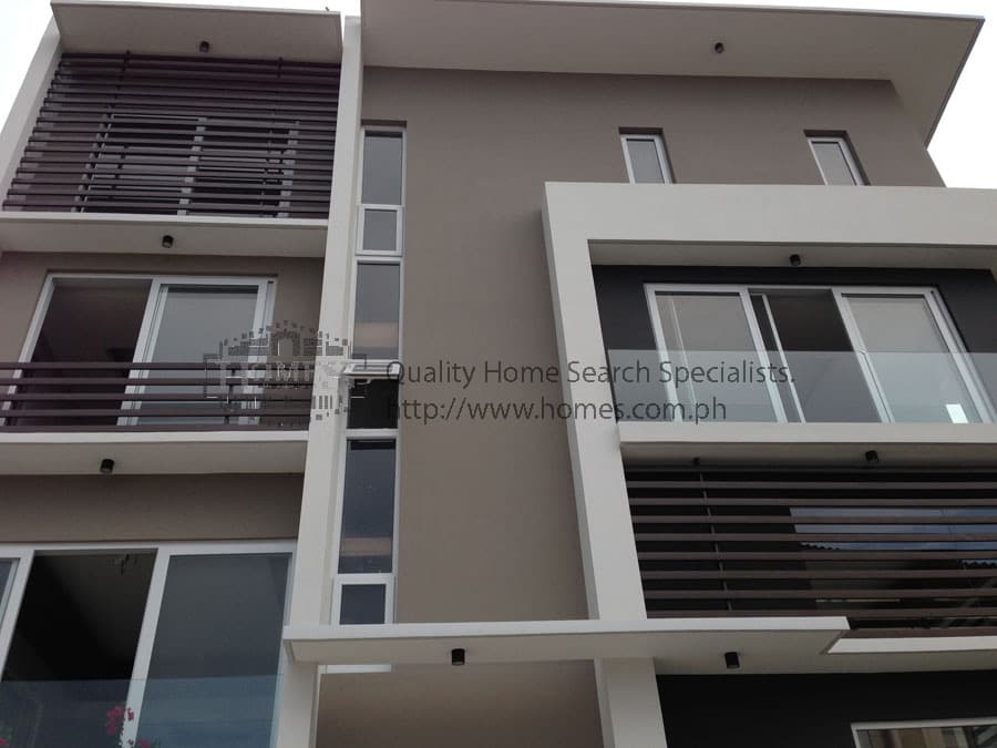 Modern three-storey house with mezanine in Mckinley Hills, Taguig